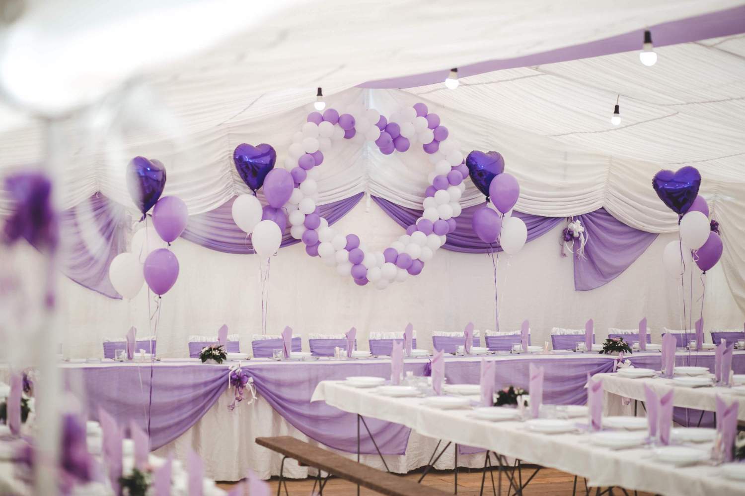 event hall with white purple balloons 11zon